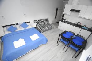 Posteľ alebo postele v izbe v ubytovaní Mazuria Apartamenty