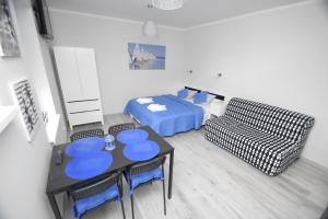 Posedenie v ubytovaní Mazuria Apartamenty