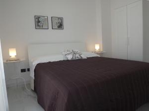 Posteľ alebo postele v izbe v ubytovaní Appartanvilla Savalè + 37 fotografií