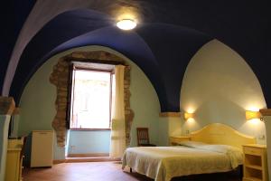 En eller flere senge i et værelse på Sa Balza Guest House