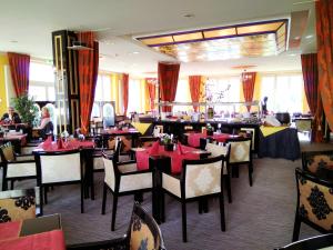 Restoran või mõni muu söögikoht majutusasutuses Alexa Hotel