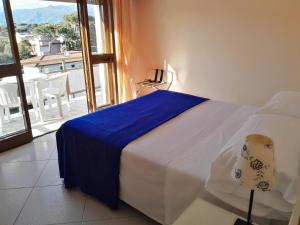 Postel nebo postele na pokoji v ubytování Hotel Elizabeth
