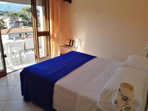 Postel nebo postele na pokoji v ubytování Hotel Elizabeth