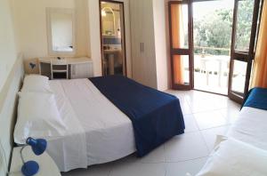 Postel nebo postele na pokoji v ubytování Hotel Elizabeth