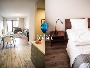 a bedroom and a living room with a bed and a desk at Apartamenty Opal in Krynica Zdrój