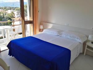 Postel nebo postele na pokoji v ubytování Hotel Elizabeth