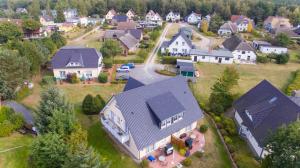 an aerial view of a residential neighborhood with houses at Gaestehaus Heuer in Baabe