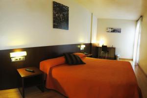 Postel nebo postele na pokoji v ubytování Hostal Nirvana