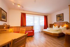 Postel nebo postele na pokoji v ubytování Apparthotel Panorama