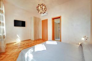 Postel nebo postele na pokoji v ubytování Locanda Delle Acque