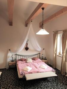 Postel nebo postele na pokoji v ubytování Penzión Villa Mon Ami