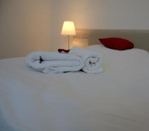 Giường trong phòng chung tại Hotel Gregor