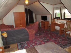 A television and/or entertainment centre at A+S Penzion Podzamok