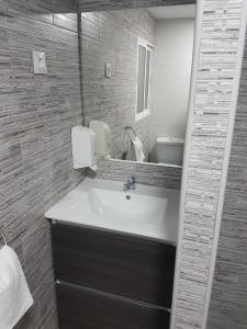 Koupelna v ubytování Guesthouse Central + 37 fotografií