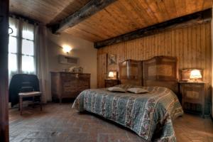 Ліжко або ліжка в номері Agriturismo il Prato