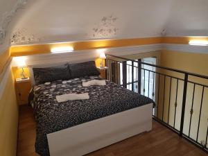 Postel nebo postele na pokoji v ubytování Central Suites Catania