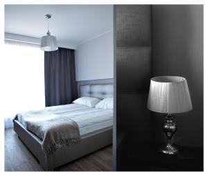 Nord House Apartament tesisinde bir odada yatak veya yataklar