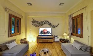 טלויזיה ו/או מרכז בידור ב-Villa Veneziano Suites & Villa