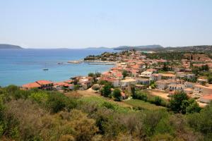 a town on the shore of a body of water at Hotel Korakakis Beach in Finikounta