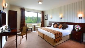 Voodi või voodid majutusasutuse Kiltimagh Park Hotel toas