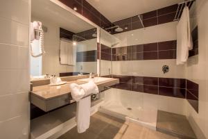 Koupelna v ubytování Hotel Beatriz Playa & Spa