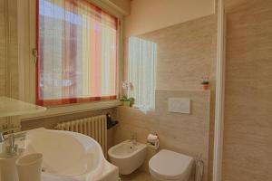 Koupelna v ubytování Hotel Europa - Sorico + 37 fotografií