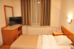 Letto o letti in una camera di Hotel Terex