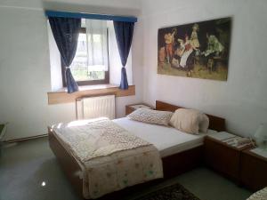 Postel nebo postele na pokoji v ubytování Guesthouse Veles
