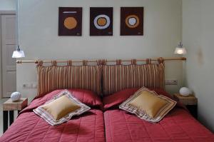Postel nebo postele na pokoji v ubytování Istron Collection Villas