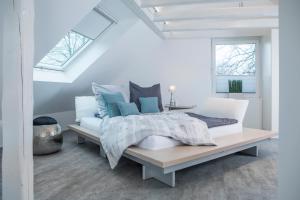 Tempat tidur dalam kamar di Design-Studiowohnung Haegestrasse