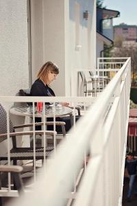 Balkón nebo terasa v ubytování Hotel Bajt Maribor