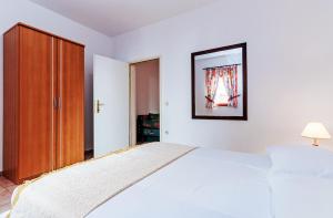 Posteľ alebo postele v izbe v ubytovaní Villa Mare Apartments