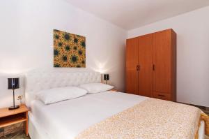 Posteľ alebo postele v izbe v ubytovaní Villa Mare Apartments