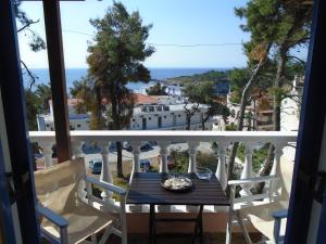 A balcony or terrace at Machi Rooms