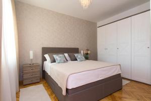 Postel nebo postele na pokoji v ubytování Holiday Home Lucija
