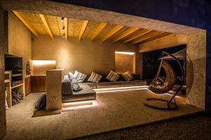 a living room with a couch and a table at Villa Cabrera loft in Colonia Sant Jordi