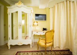 TV a/nebo společenská místnost v ubytování Palazzo Venezia-Adults Only