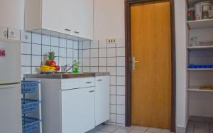 Kuchyň nebo kuchyňský kout v ubytování Apartments Jadranovo
