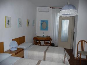 Postel nebo postele na pokoji v ubytování B&B Selisa