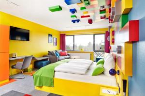 Postel nebo postele na pokoji v ubytování Hotel Legoland