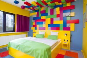 Postel nebo postele na pokoji v ubytování Hotel Legoland