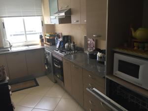 Köök või kööginurk majutusasutuses Appartement de Luxe chez Hicham