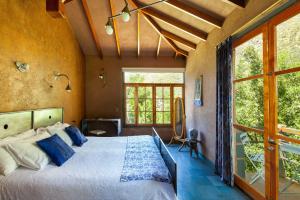 Cama o camas de una habitación en Hotel Altiplanico Cajón del Maipo