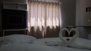 Postel nebo postele na pokoji v ubytování Flat Beira Rio