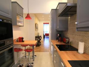 Kuchyň nebo kuchyňský kout v ubytování La Suite Terreaux