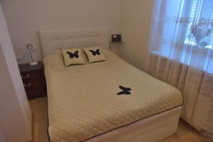 Postel nebo postele na pokoji v ubytování Jurmala Guest House Markiza