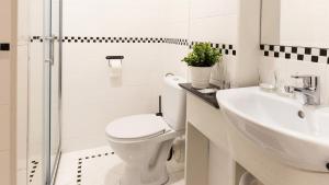 Koupelna v ubytování Rooms Kaktus