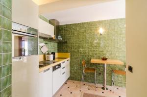 Kuchyň nebo kuchyňský kout v ubytování Studio apartment Antica