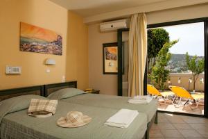 Posteľ alebo postele v izbe v ubytovaní Villiana Holiday Apartments + 37 fotografií