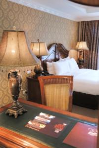 Postel nebo postele na pokoji v ubytování Villa Caceres Hotel